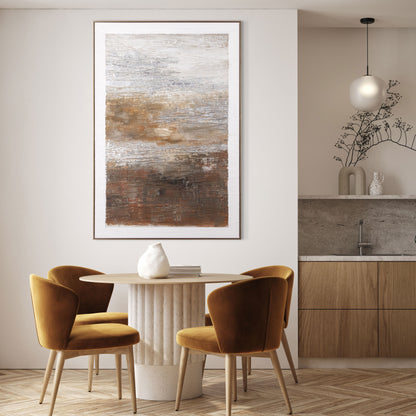 Vertical brown and silver abstract painting above a dining table with mustard chairs.