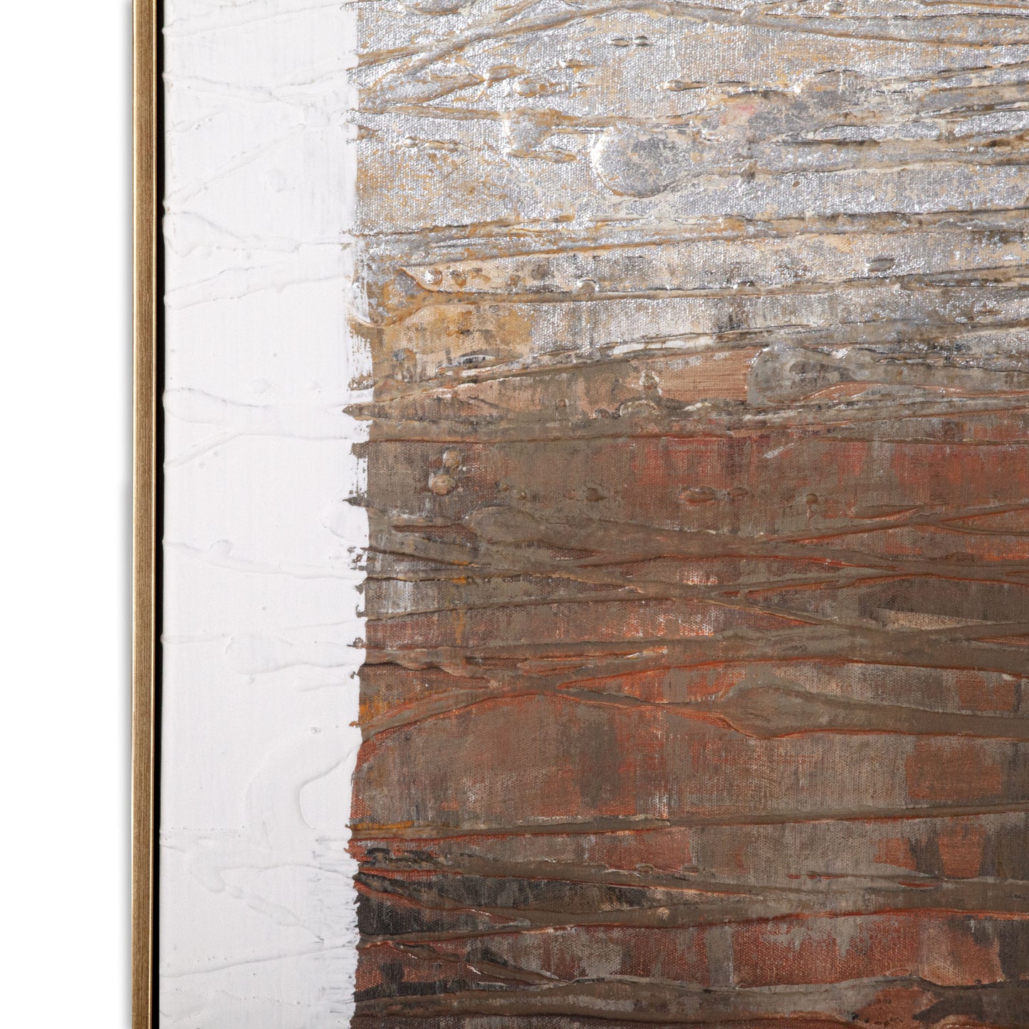 Close-up of brown and silver abstract textured wall art with layered brushstrokes and a gold frame.