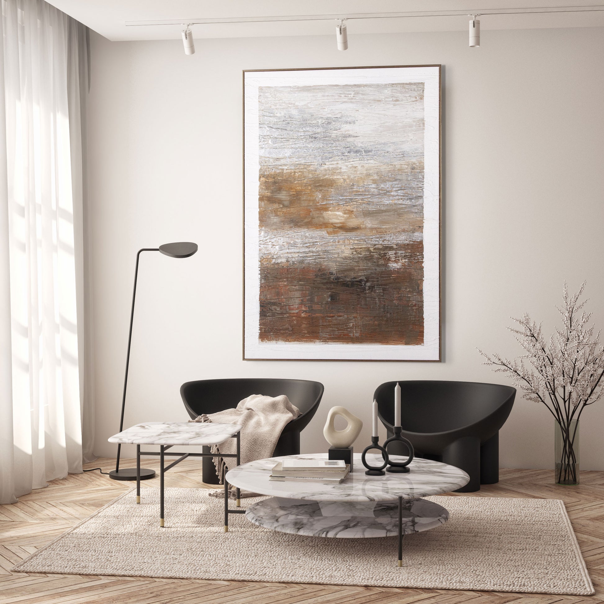 Bright living room with textured brown and silver wall art framed in gold.