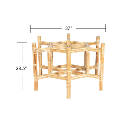 Hexagonal rattan dining table base with dimensions of 37 inches wide and 28.5 inches tall.