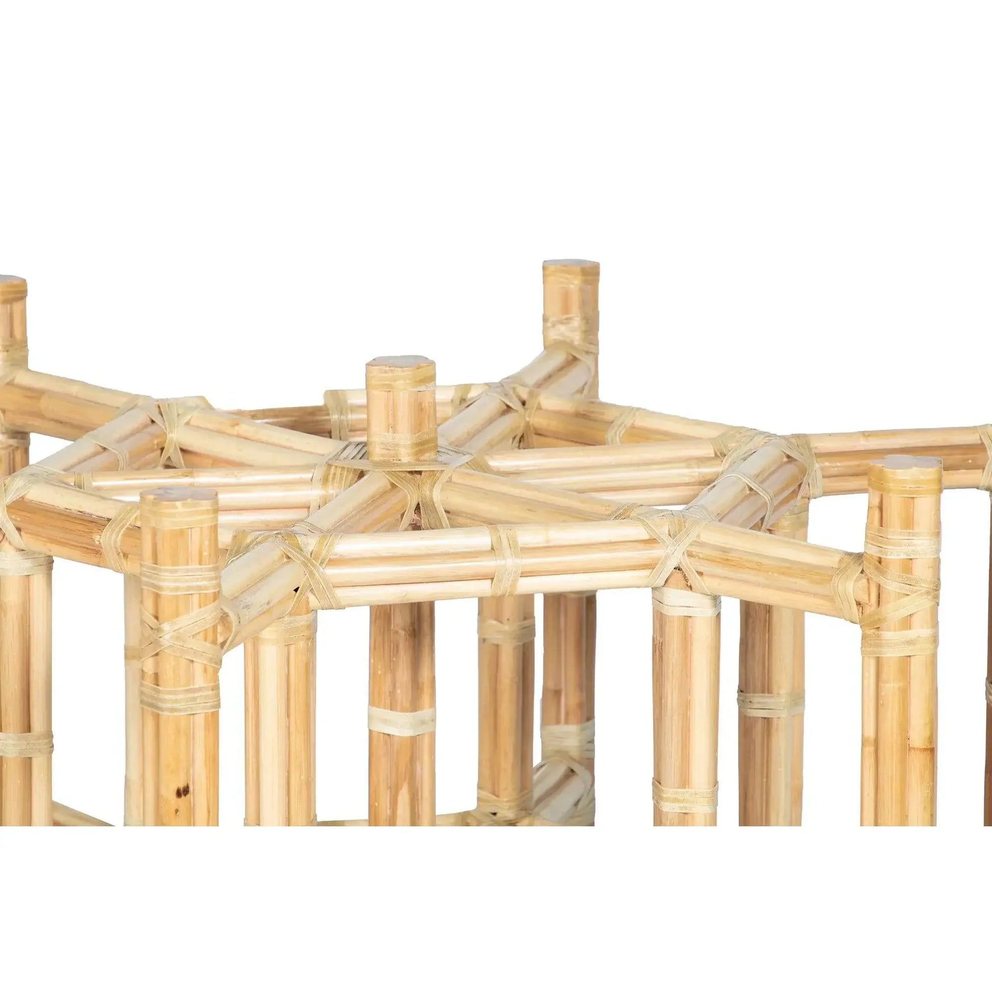 Close-up of the natural rattan hexagonal table base showcasing detailed craftsmanship and rattan weaving.