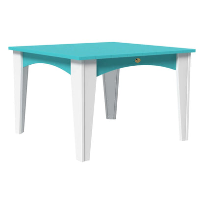 Vibrant square dining table with an aruba blue top and white legs, adding a pop of color to any outdoor space.