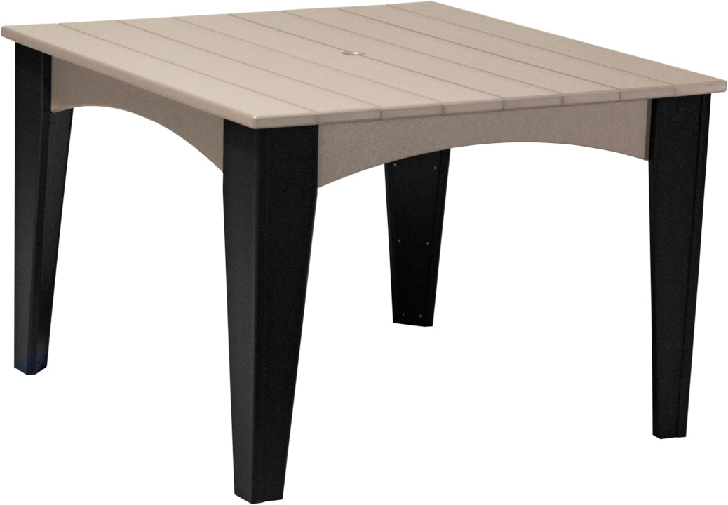 Chic outdoor dining table in black and weatherwood, offering a sophisticated touch to patio designs.