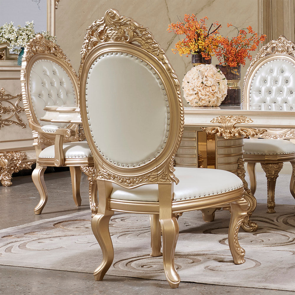 HOMEY DESIGN HD-9093 dining chair with white leather upholstery and gold detailing.