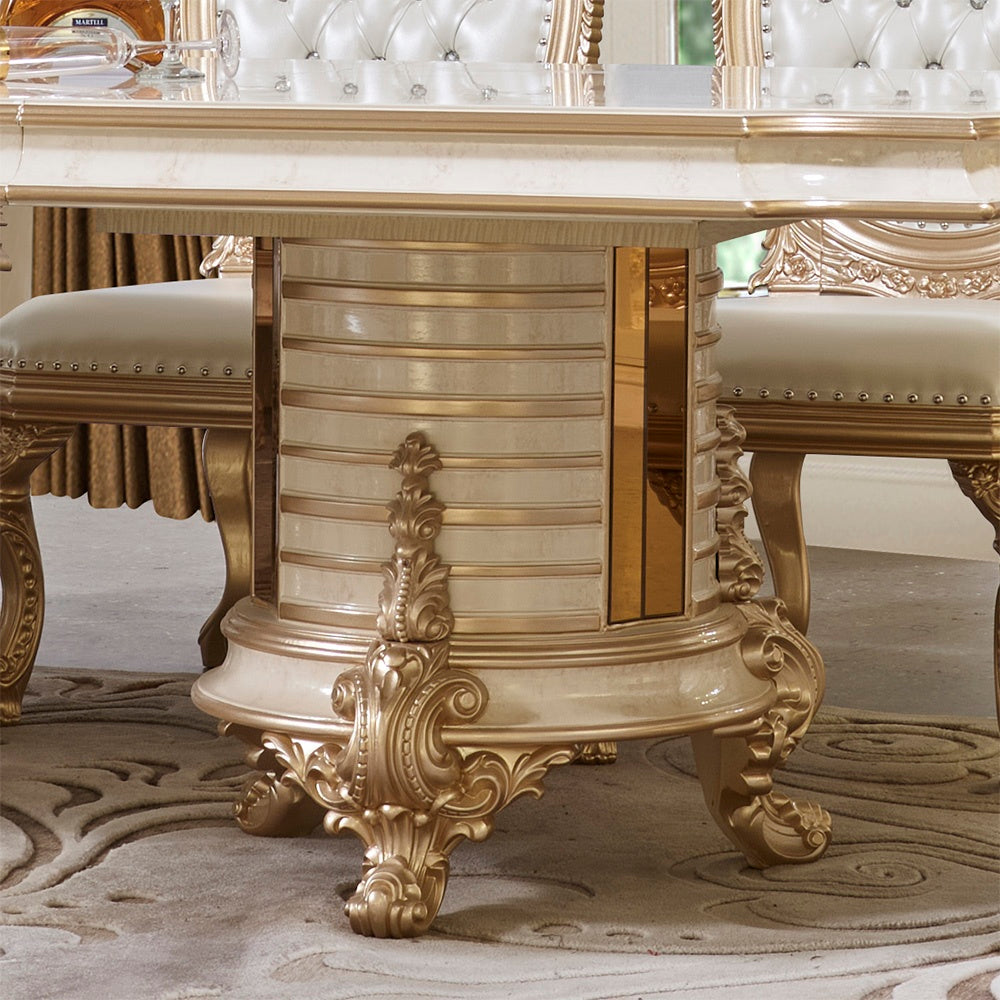 Close-up of the HOMEY DESIGN HD-9093 dining table's ornate double pedestal base with gold accents.