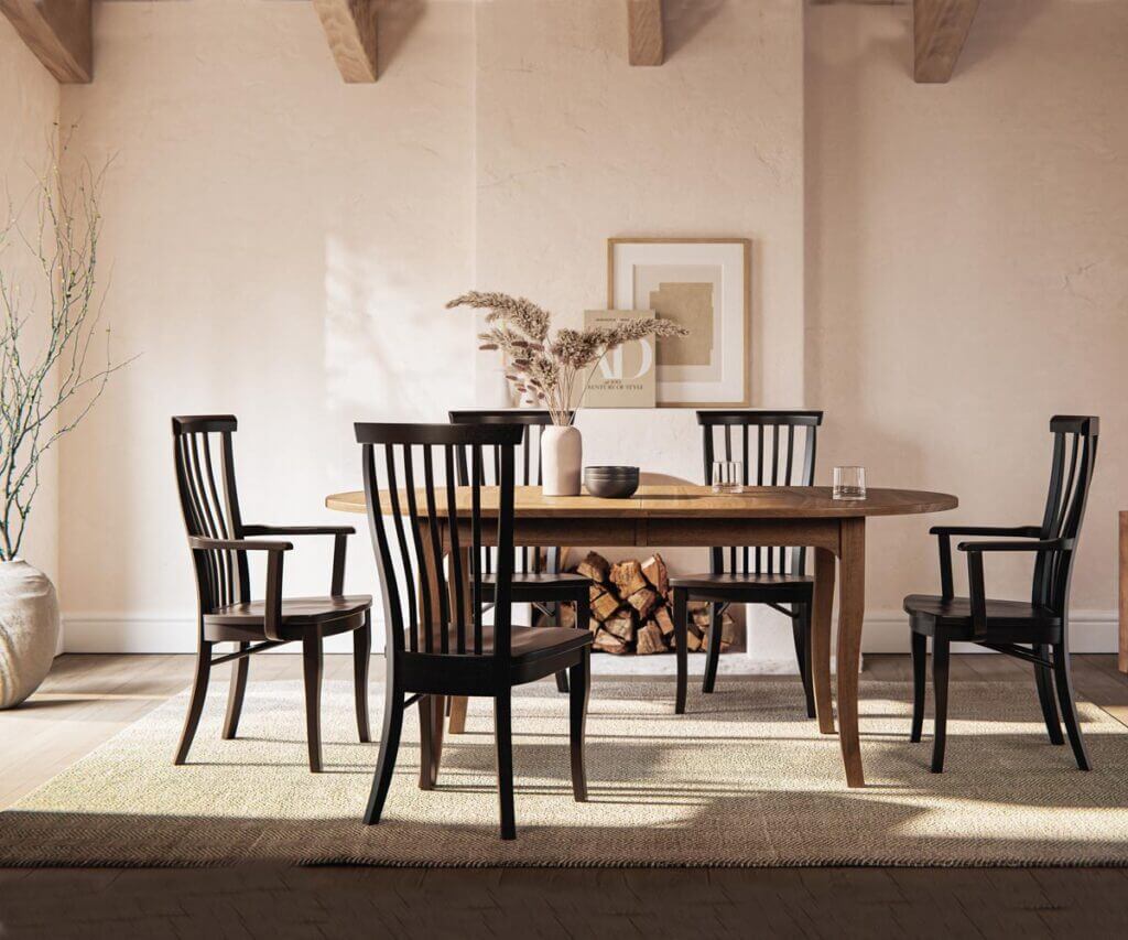 Kiona Oval Dining Table set in a cozy dining room with wooden chairs and natural decor.