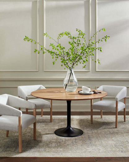 Anatalia Round Dining Table with natural acacia top in a modern dining area.