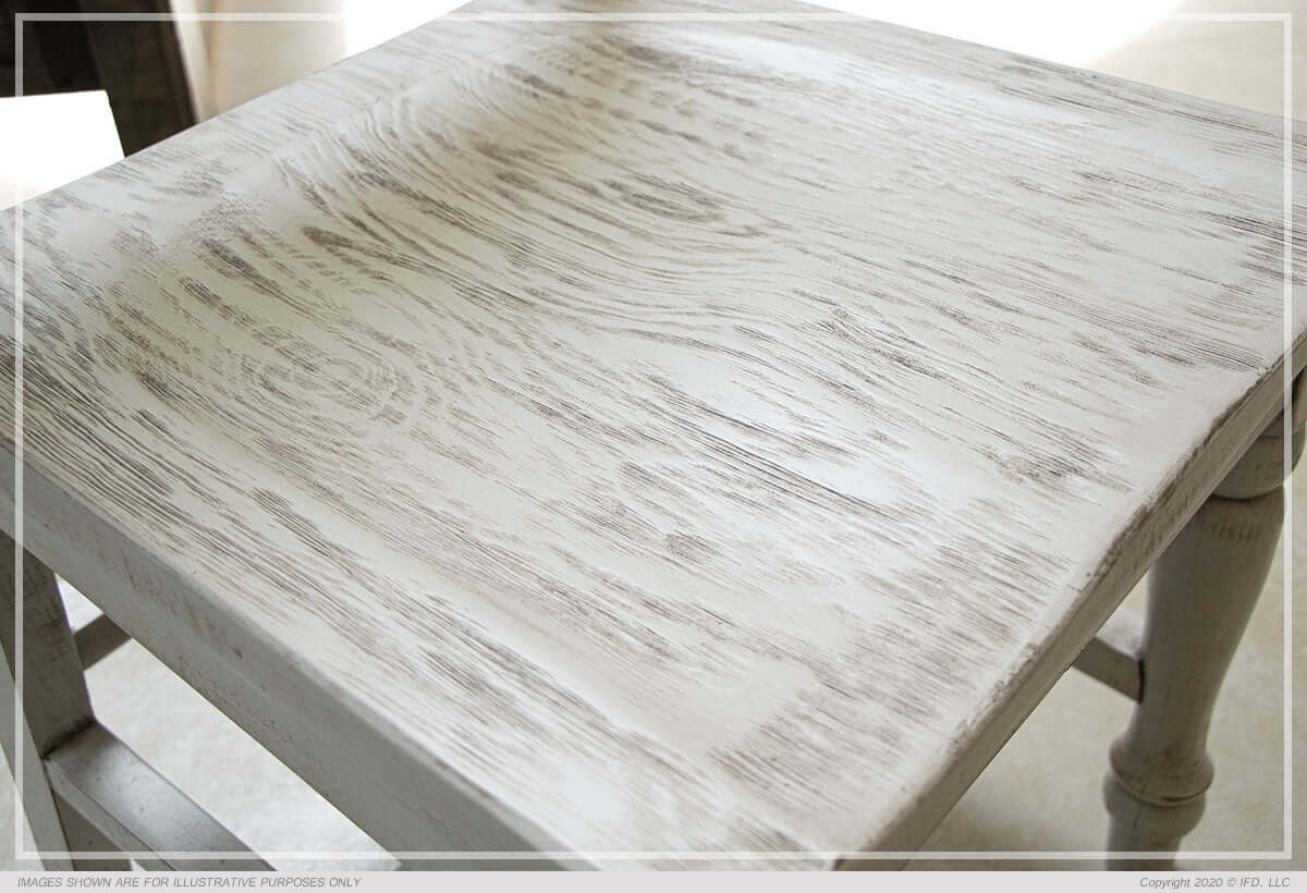 Close-up of the Rock Valley Dining Chair seat, showcasing the rubbed-through details on the solid wood.