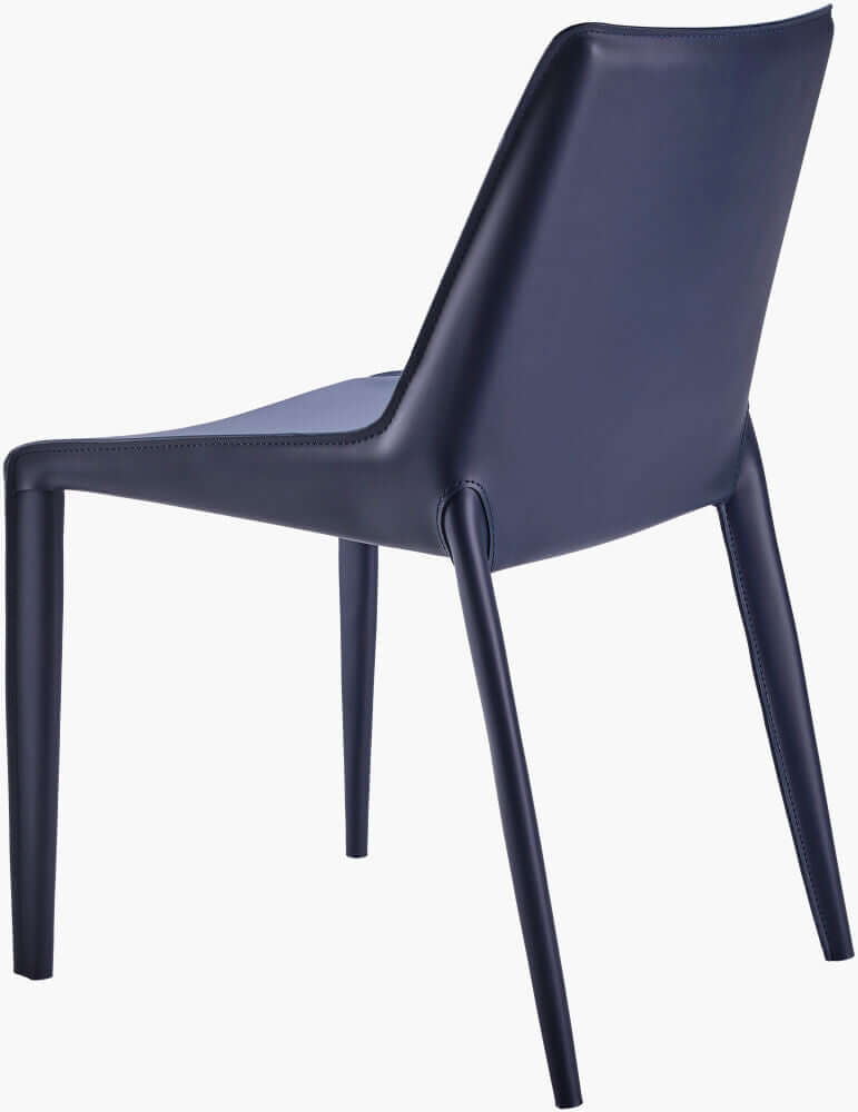 Back view of Surya Hanks Navy Dining Chair, showcasing the smooth faux leather upholstery and sturdy construction.