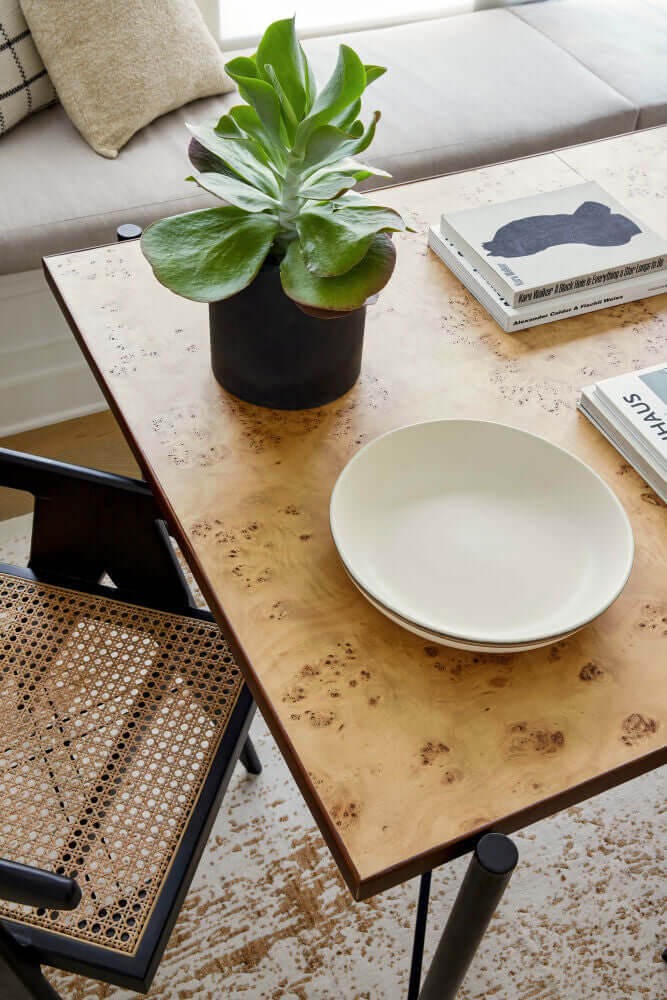 Close-up of the Judith Dining Table top highlighting the natural grain of the mango wood.