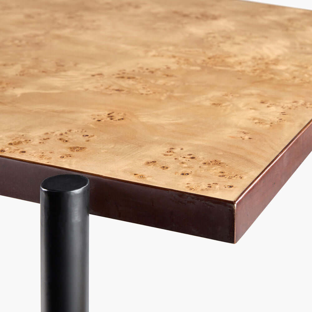 Detailed view of the corner of the Judith Dining Table emphasizing the quality finish.