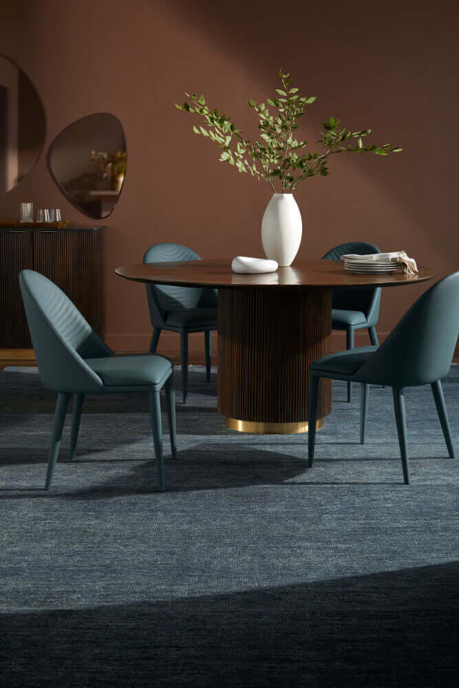 Dining room featuring Lacey Teal Dining Chairs with a round table