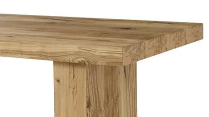 Detailed corner view of the Emilia 87” Dining Table, showing the wood texture.