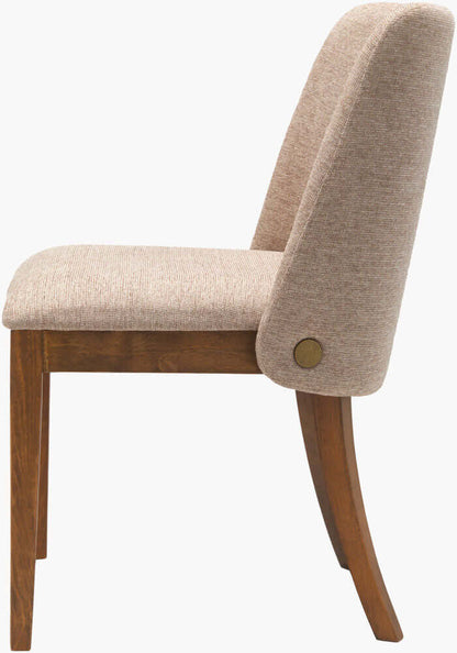 Side view of Surya Brooke Dining Chair showcasing medium brown upholstery and curved wheat-colored backrest.