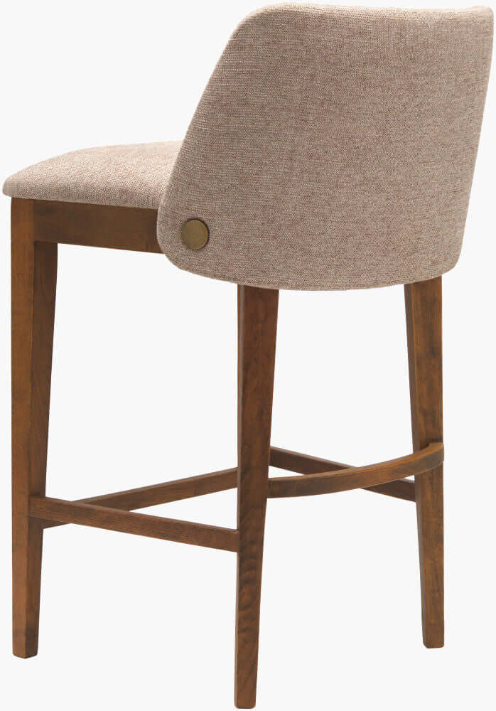 Back view of the Brooke Counter Stool showcasing its smooth upholstery and wooden base in a modern design.