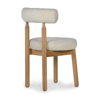 Back view of the Centro Dining Chair Natural by Union Home, emphasizing the simple and modern design.