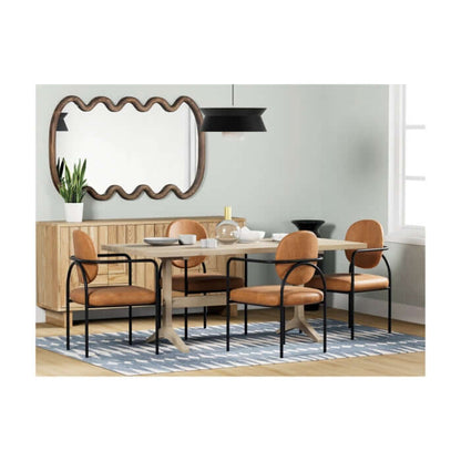 The Denver Dining Table Natural in a stylish dining room setup, paired with modern chairs and decor.