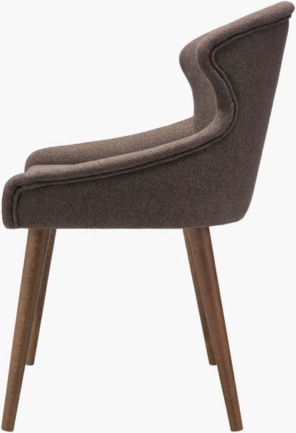 Side profile of the Halie Dining Chair with detailed brown upholstery and tapered beechwood legs.