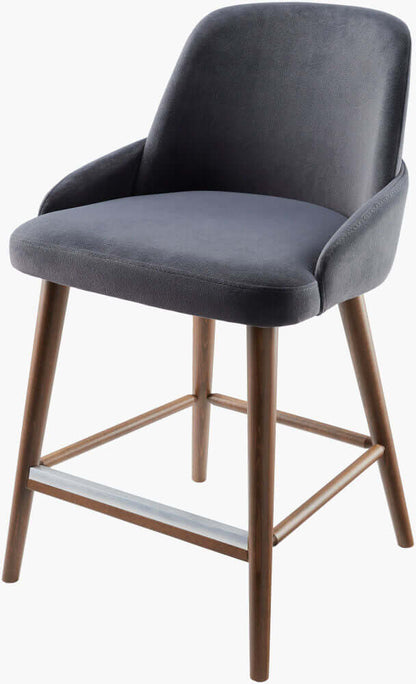 Angled view of the Peregrine Counter Stool, showcasing its modern design and comfortable faux suede seat.