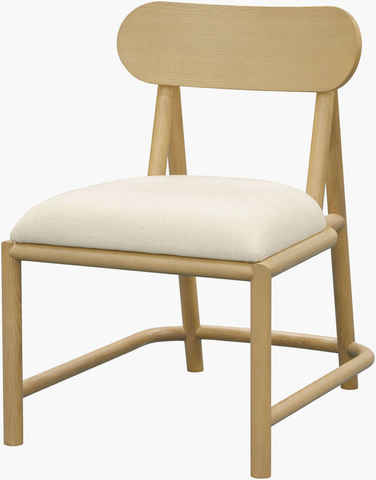 Front angle view of the Keating Dining Chair by Surya, showcasing its oak wood frame and soft beige upholstered seat, blending modern design with comfort.