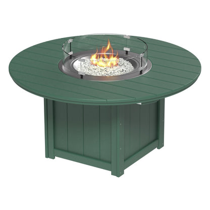 Forest green 60" round fire table with fire glass gems, creating a cozy outdoor ambiance.