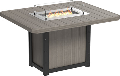 Sophisticated setup of the Lumin 62" Fire Table in Coastal Gray & Black, perfect for evening social events.