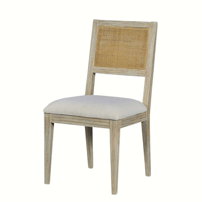 Full view of the Caine I Dining Chair with weathered finish, featuring a cane-insert backrest and upholstered seat.