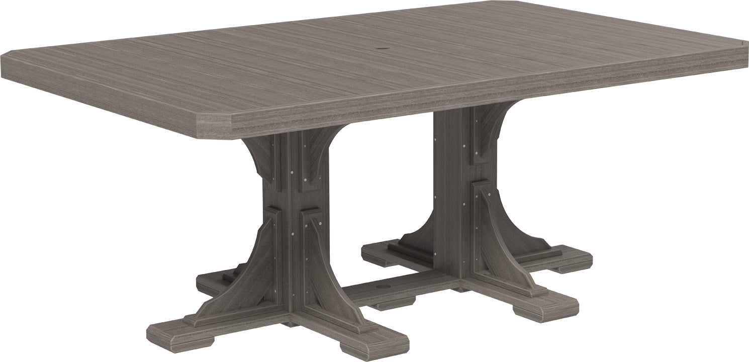 Coastal Gray 4' x 6' Rectangular Dining Table set outdoors, offering a modern and neutral aesthetic.