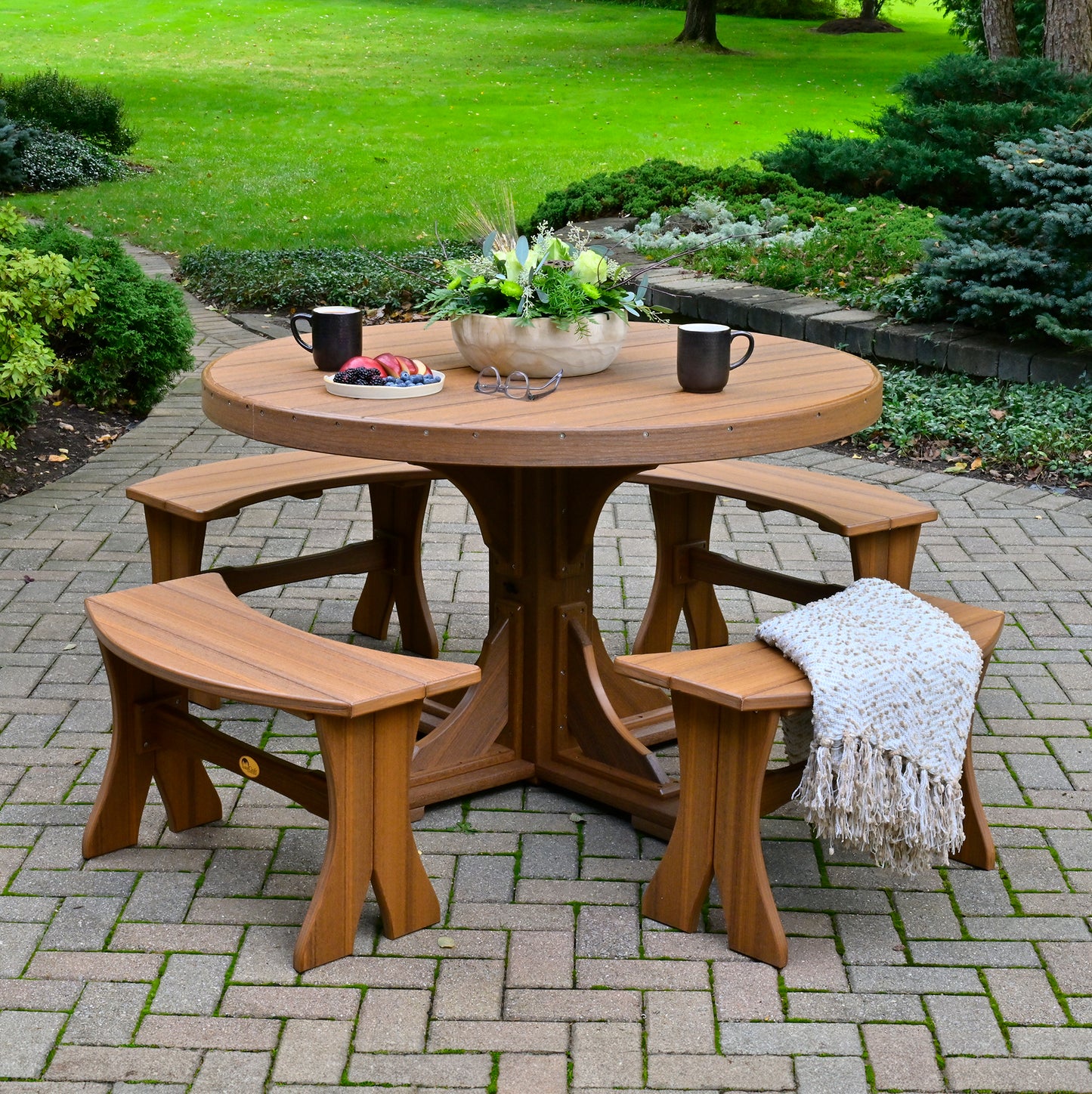 Antique Mahogany Poly Counter Round Table set with seating, ready for outdoor dining and relaxation.