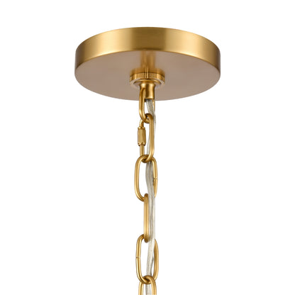 Brushed gold canopy and chain of the Abaca 20'' chandelier.