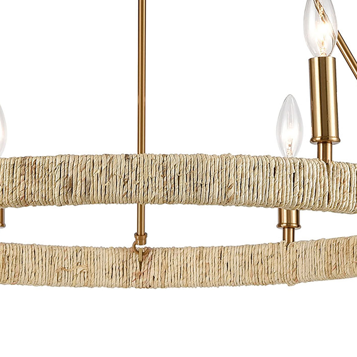 Close-up of Abaca rope detailing on the satin brass chandelier.