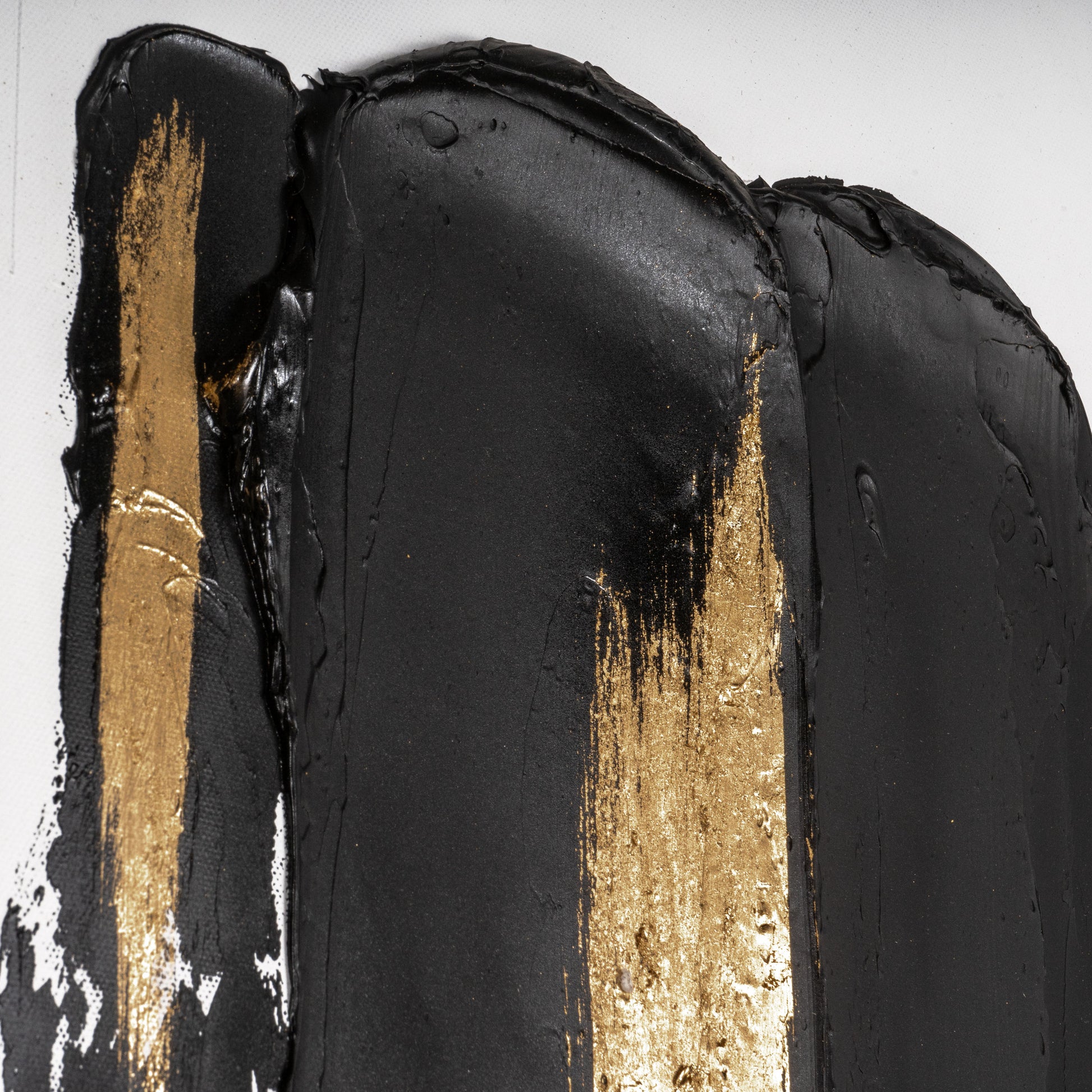 Close-up of textured black and gold brushstrokes on the Abstract Harmony canvas, highlighting artisanal craftsmanship.