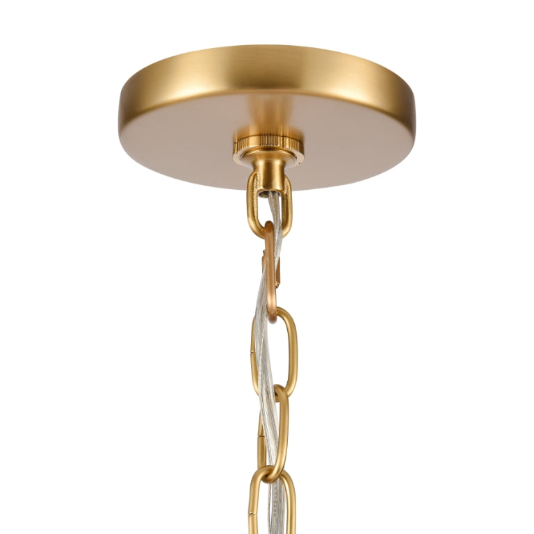 Gold chandelier canopy and adjustable hanging chain detail.