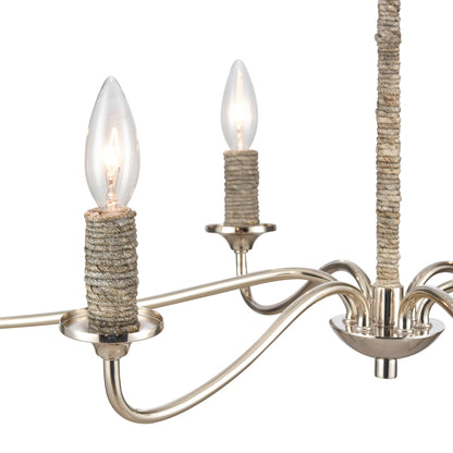 Close-up of Abaca rope-wrapped candelabra-style chandelier arms in polished nickel.