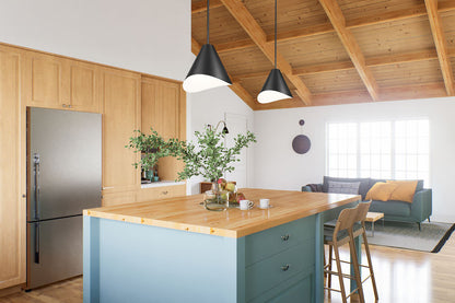Matte black conical pendant lights in wood beam ceiling kitchen