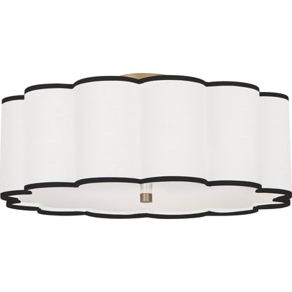 Scalloped flush mount with aged brass details and white acrylic diffuser.