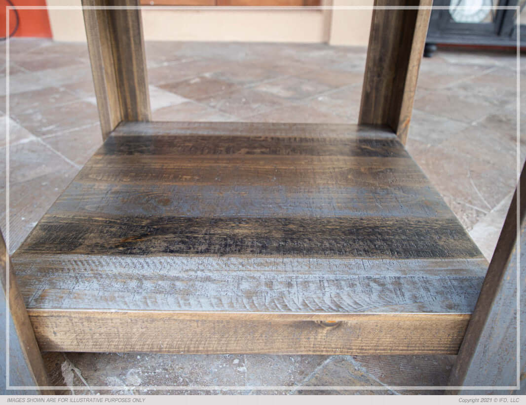 Base detail of the Loft Brown 54" Square Dining Table, showing the solid wood support structure.