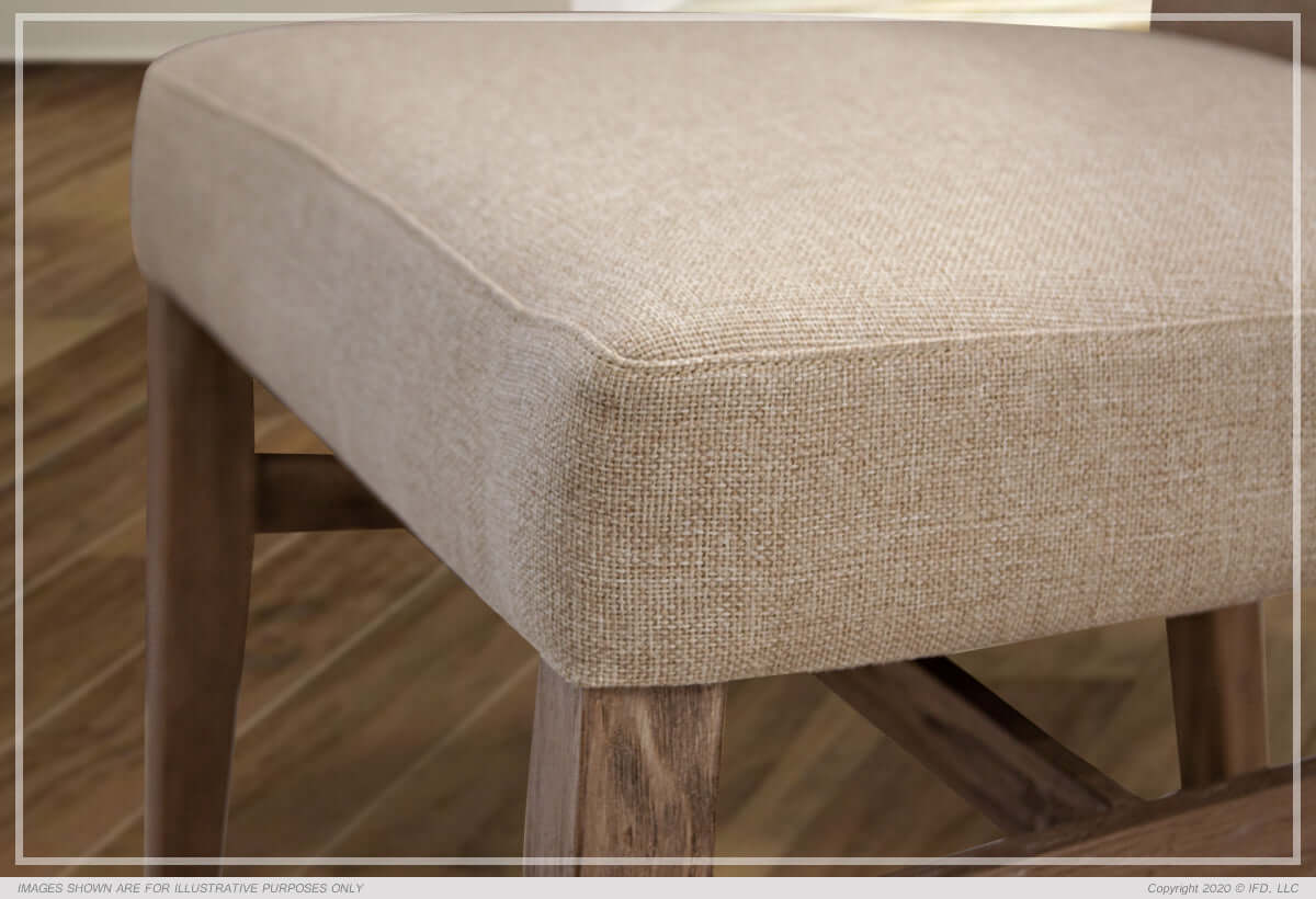 Close-up of the beige upholstered seat of Bonanza Dining Chair.