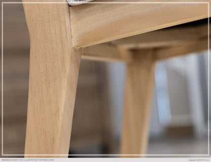 Detailed view of the Giza Dining Chair's wooden frame and upholstered seat.