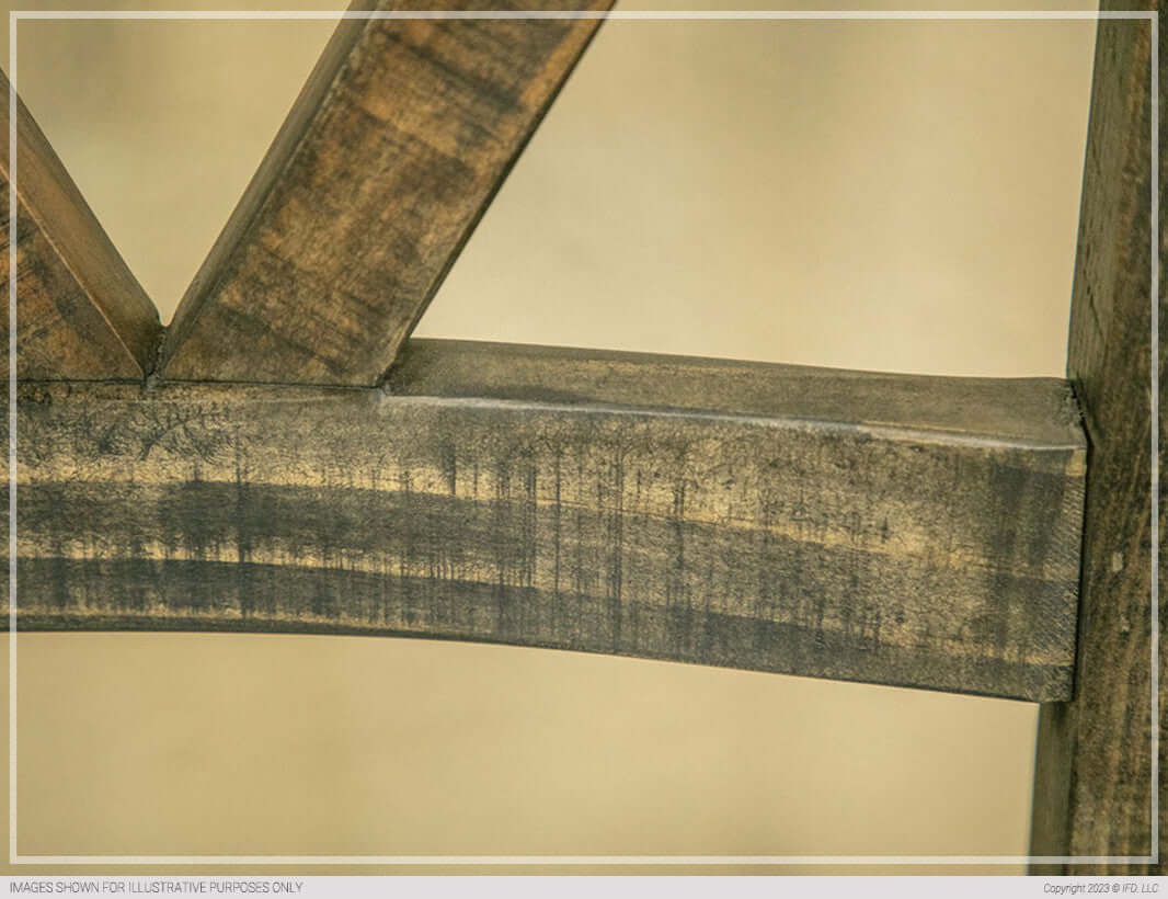 Close-up of the wood grain and finish on the Loft Brown Wooden Dining Chair frame.