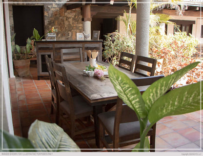 Antique Gray Dining Table in an elegant dining setting with matching chairs, perfect for family gatherings.