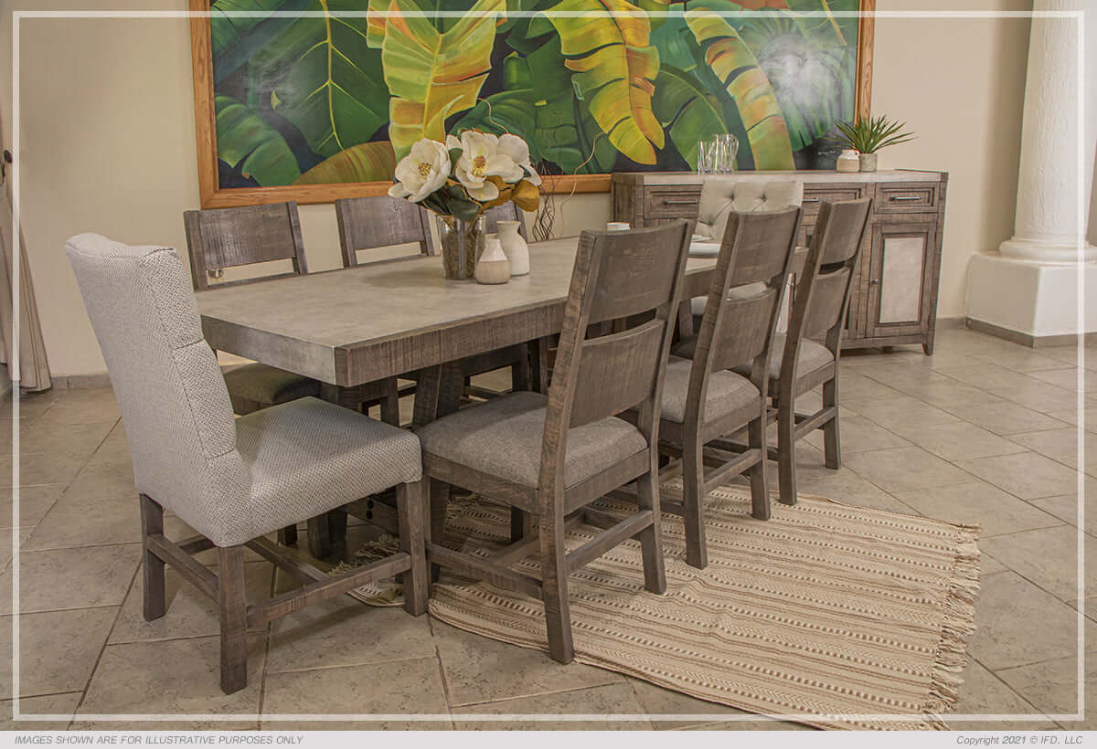 Side view of faux marble dining table with chairs and decorative settings.