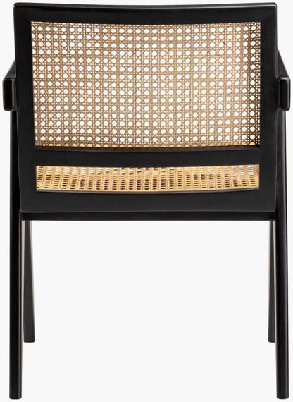 Back view of Surya Hague Rattan 
Dining Arm Chair in black with detailed rattan weaving on backrest.