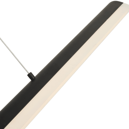 Hero shot of matte black bar pendant light glowing warmly.