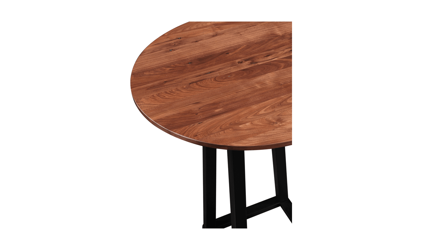 Close-up view of the Tri-Mesa Brown Bar Table's solid walnut top showcasing its natural grain and finish