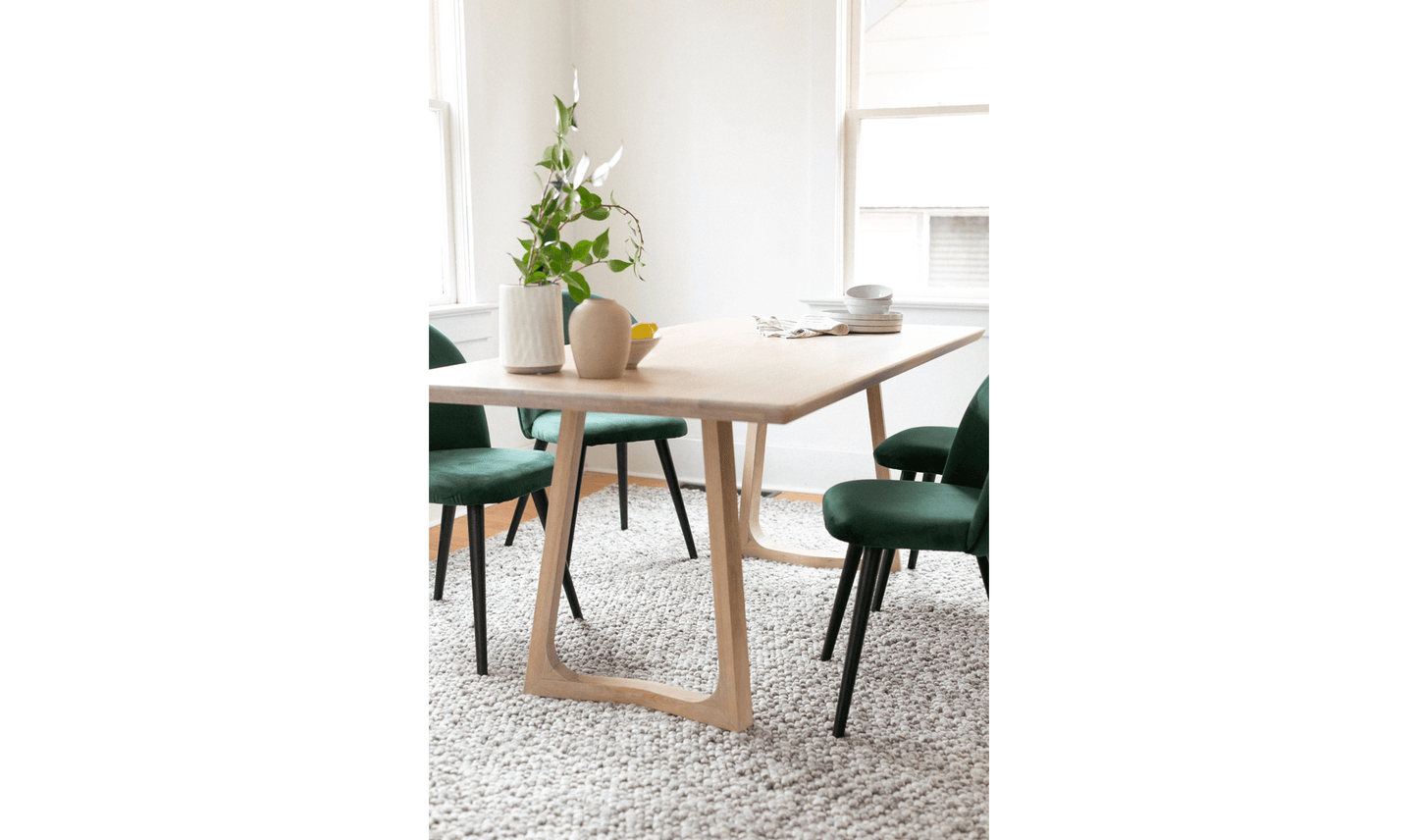 Dining room with Silas White Oak Dining Table and natural light.