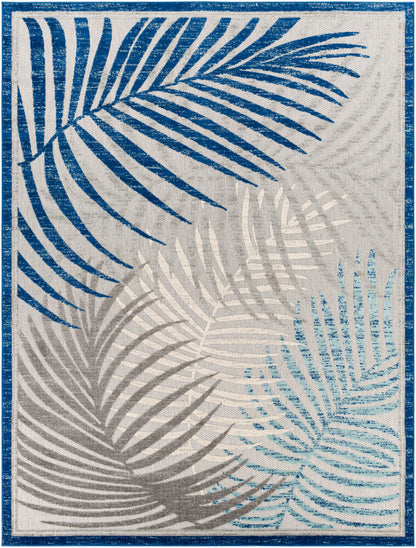 Blue and gray tropical palm leaf-patterned area rug with bold aqua and cream accents.