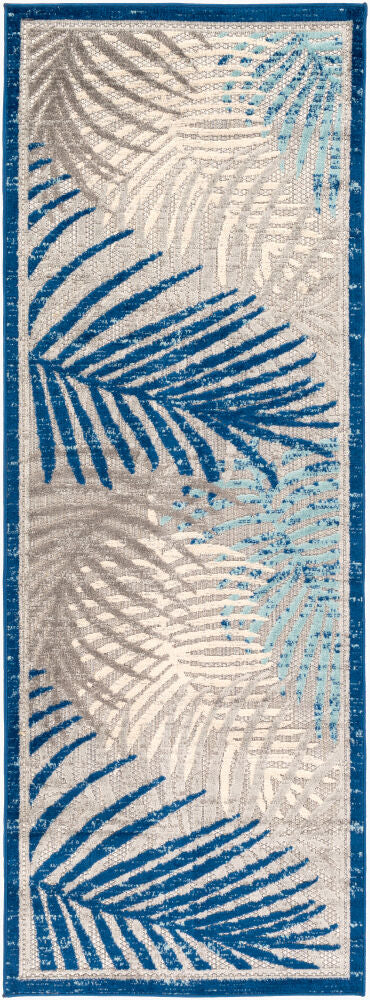 Runner-style tropical area rug with blue and gray palm leaf patterns.