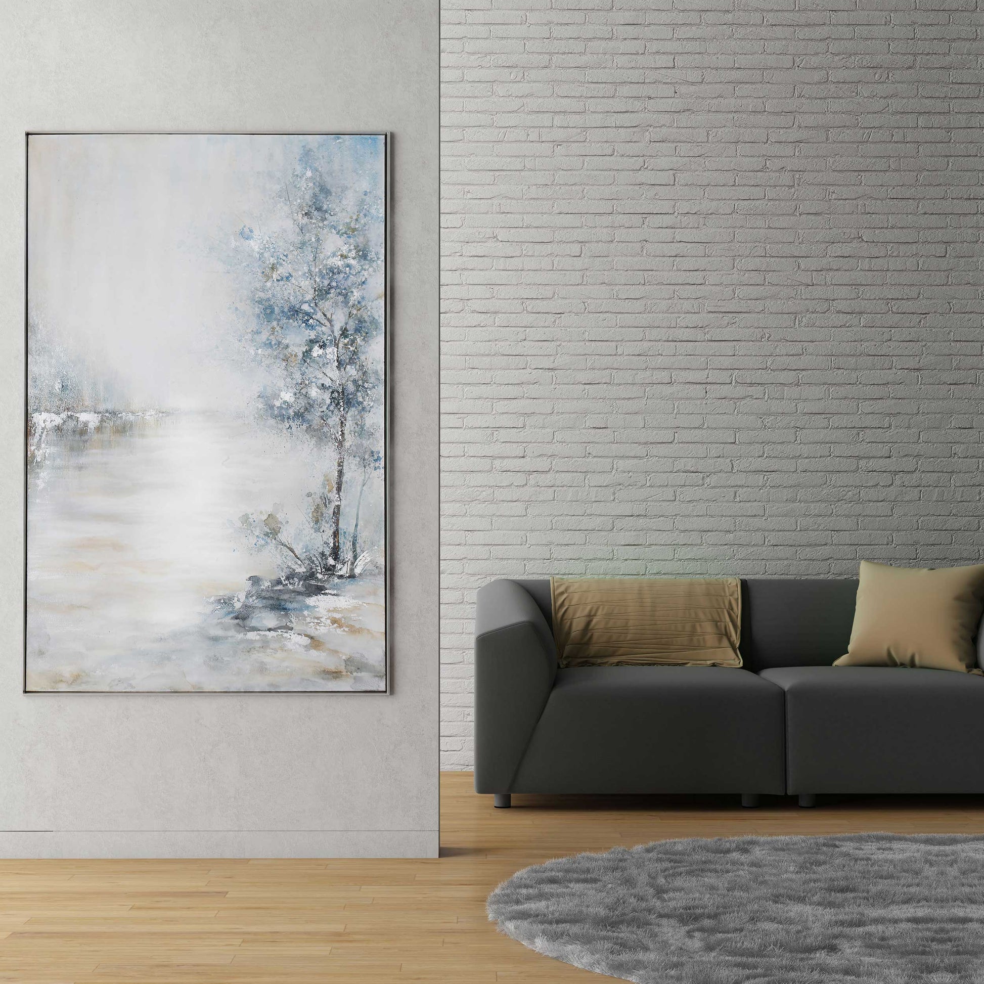 Blue Meadow hand-painted canvas with silver leaf accents, displayed beside a modern gray sofa.