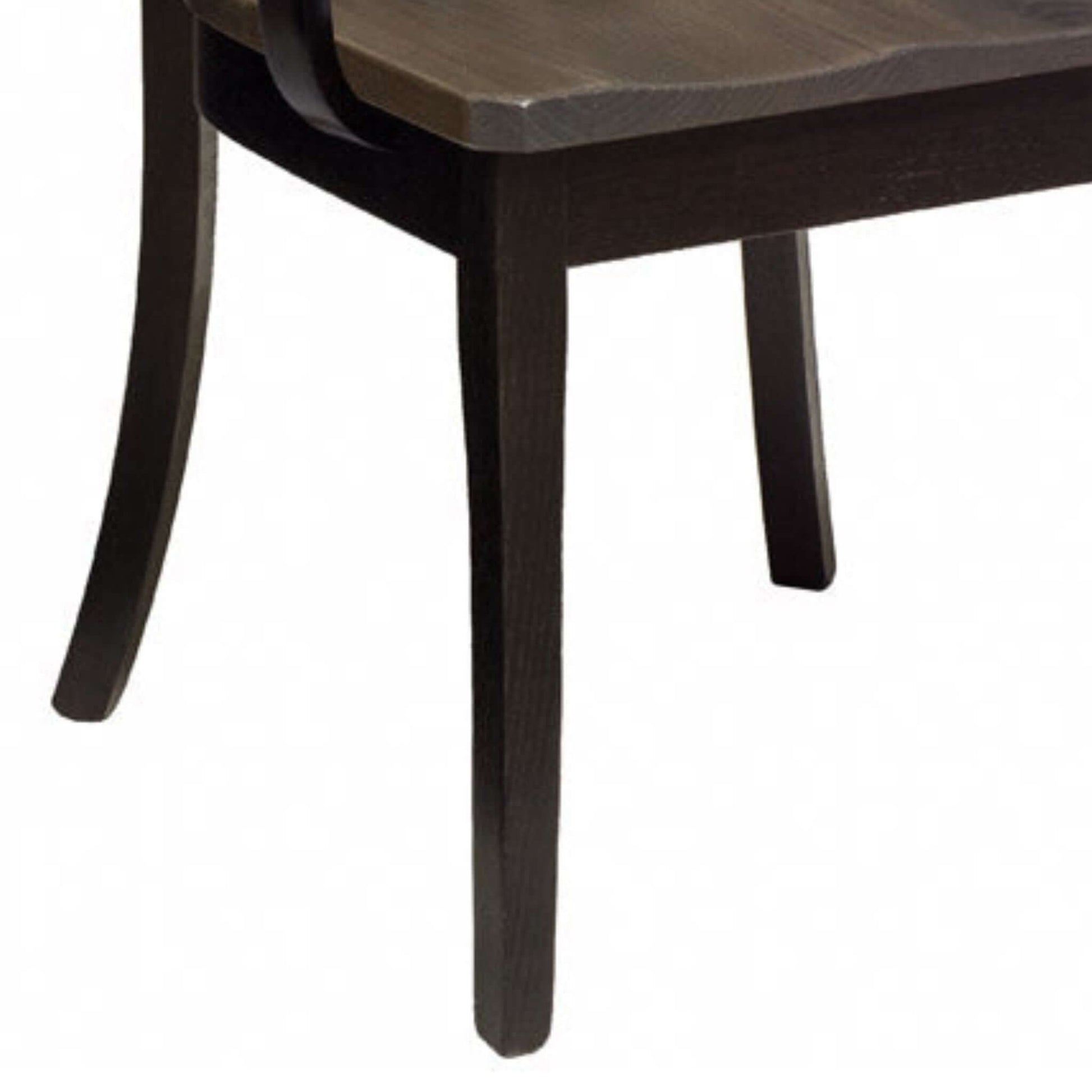 Elegant leg design of the Bristol Amish Dining Room Arm Chair in ebony finish.